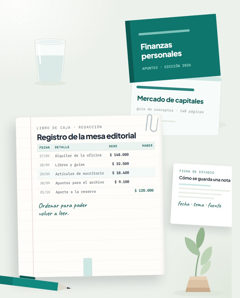 Escritorio de estudio con un cuaderno de finanzas, una birome y luz suave de la mañana